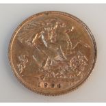 An Edward VII gold half sovereign, dated 1908, 4g, 2cm dia.