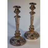 A pair of 19thC Old Sheffield Plate candle sticks, of classical form the urn dish holders with