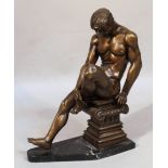 A bronzed figure, of a gentleman, on a classical stepped base and textured marbled plinth, cast