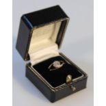 A 9ct gold solitaire ring, with illusion set cubic zirconium and shaped pierced shank.