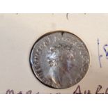 An Aurelius Caesar silver coin, 2cm dia.