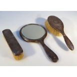 A George V silver two piece dressing table set, comprising hair brush and clothes brush,