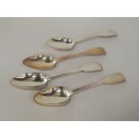 A set of four William IV silver Fiddle pattern serving spoons, all initialled 'S', London 1831,