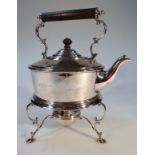 An early 20thC silver plated spirit kettle on stand, of circular form with a hanging cylindrical