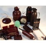 Various early 20thC Bakelite, to include a 1925 thermos, 26cm high, mantel clock, various egg