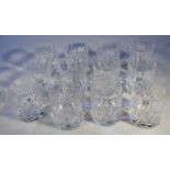 A set of twelve crystal glass whisky tumblers, of circular form, each with hobnail cut geometric