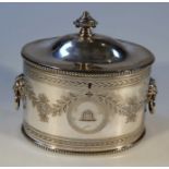 An Edwardian silver plated tea caddy, of oval form with a dome top lid centred with urn knop, the