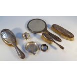A George VI silver part dressing table set, to include hair brush, 23cm high, clothes brush, hand