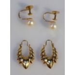 A pair of ladies ear studs, set with cultured pearls with screw ends, yellow metal marked 9ct, two