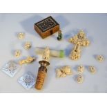 Various ivory bone and mother of pearl, to include an early 20thC cross carved with flowers and