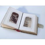 A 19thC tartan ware photograph album, with Clan Ronald tartan boards and exterior gilt metal