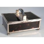 An Edwardian silver and tortoiseshell cigarette case, the rectangular body centred by a moulded