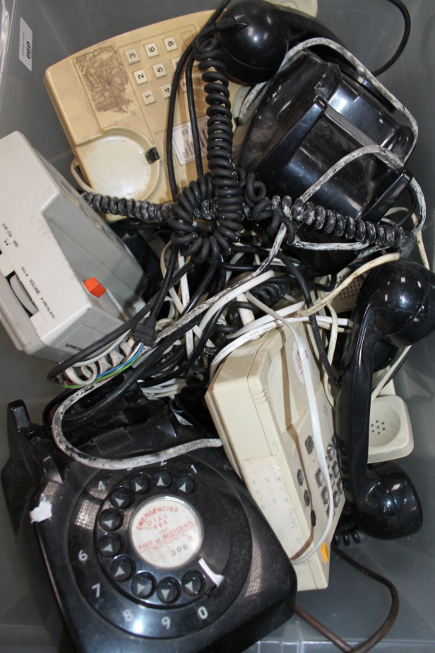 A quantity of mid-20thC and later telephones and accessories, to include several black plastic and