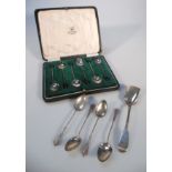 A cased set of six George V silver bean spoons, by William Suckling, Birmingham 1923, and a small