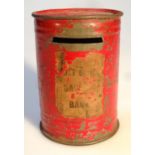 An early 20thC tinplate post box money bank, with an upper slot on a circular foot, painted red,