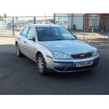 A Ford Mondeo LX, 5 door hatchback, registration FY04 AVF, petrol engine, silver, MOT until 1st