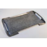 A Tudric pewter Art Nouveau tray, with stylized floral spandrels and moulded side handles,