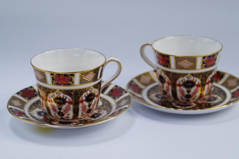 Two Royal Crown Derby Old Imari 1128 pattern cabinet cups and saucers