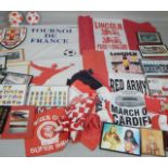 A collection of football related pictures and flags, to include a print signed by Tommy Smith and