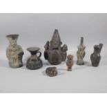 A collection of pre Columbian type pottery vessels, to include a triple headed jug, a vase, bird