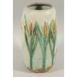 A Bourne Denby ware vase, decorated with birds in the ferns, 29cm high