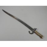 A 19thC French bayonet, indistinctly engraved, and dated 1868, with brass handle, 70cm long.