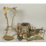 A collection of brass, to include part set of weights, horse brasses with martingales, trivet,