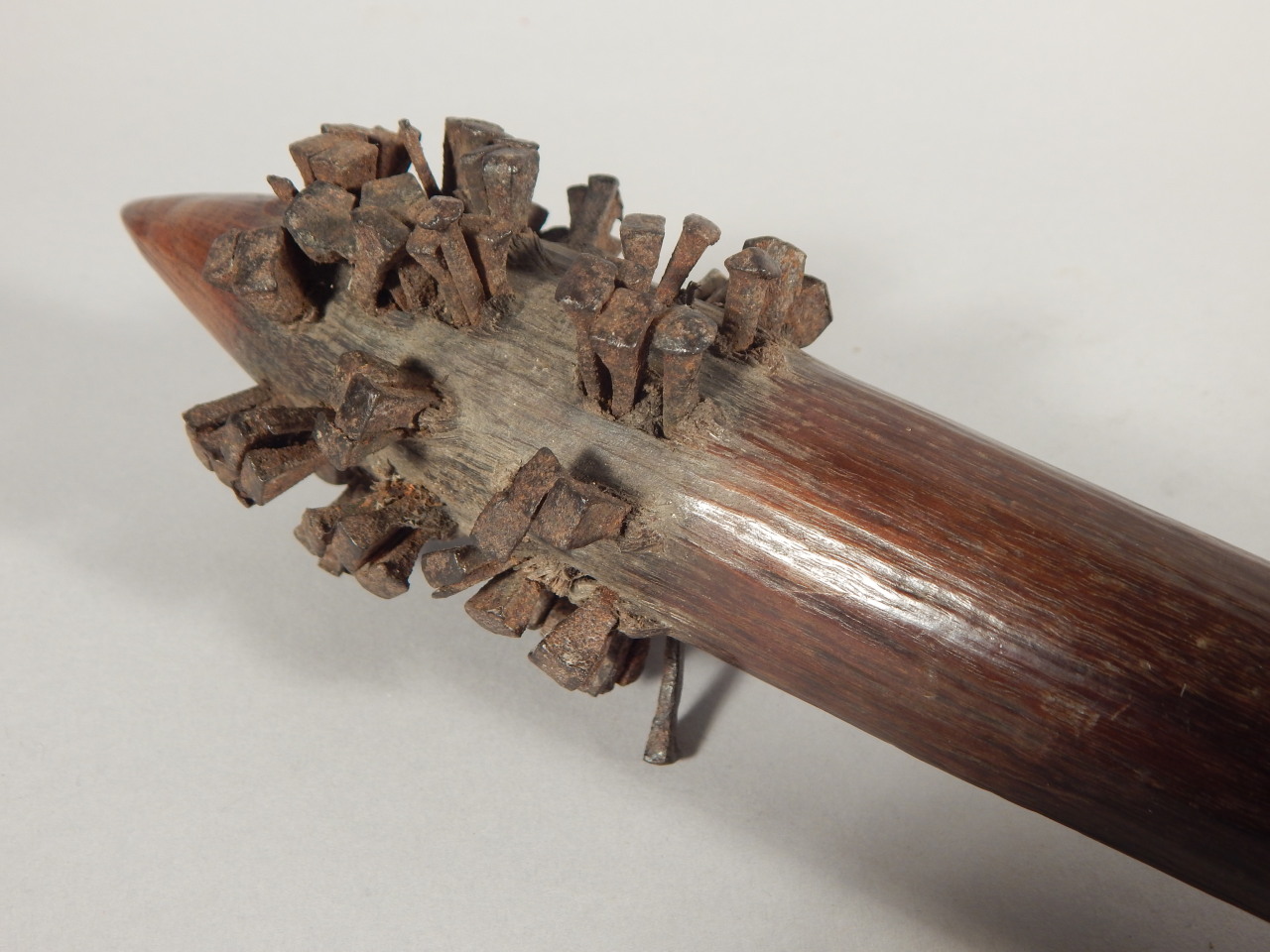 Tribal Art. A 19thC Aboriginal nail club, with incised handle, possibly Queensland or New South - Image 2 of 3