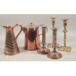 A collection of metalware, to include a pair of silvered brass candlesticks, a pair of Old Sheffield