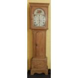 A 19thC longcase clock, the arched dial painted with flowers, with eight day four pillar movement,