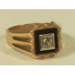 A gentleman's signet ring, with illusion set stone, yellow metal, marked 375.