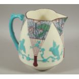 A large 19thC Wedgwood wash jug, with blue relief handle, oriental fans and blue birds, 25cm high