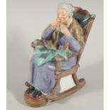 A Royal Doulton figure, A Stitch In Time, HN2352, 18cm high