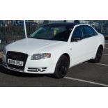 An Audi A4 saloon, registration AU05 XVJ, in white, with painted black trims, diesel, five door,