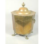 An Edwardian copper coal bucket, the lid with a turned finial, above side handles, in Art Nouveau