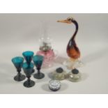 A quantity of decorative glassware, to include a duck ornament, two inkwells, a Millefiori