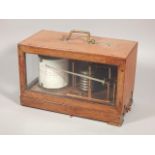 An early 20thC mahogany cased barograph, stamped Wilson Warden & Co Ltd., London, number 3843/42/53,