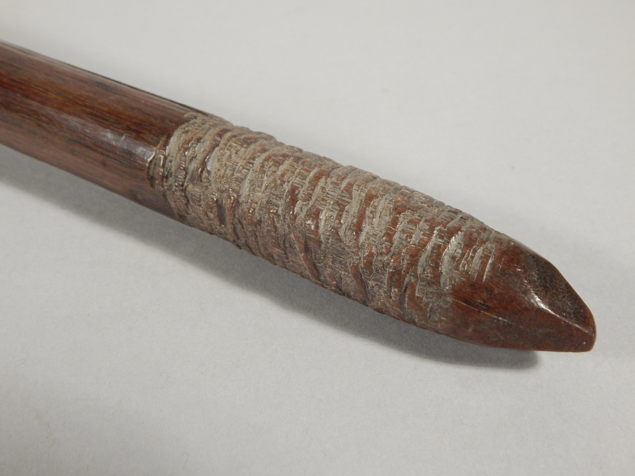 Tribal Art. A 19thC Aboriginal nail club, with incised handle, possibly Queensland or New South - Image 3 of 3