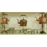 A collection of copper and brassware, to include three copper kettles and various trivets