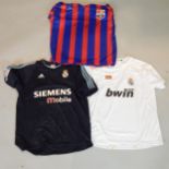 Three Spanish related football shirts, one Barcelona bearing various signatures and two Real Madrid