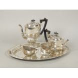A Mappin & Webb silver four piece tea and coffee service with tray, with part fluted decoration, the