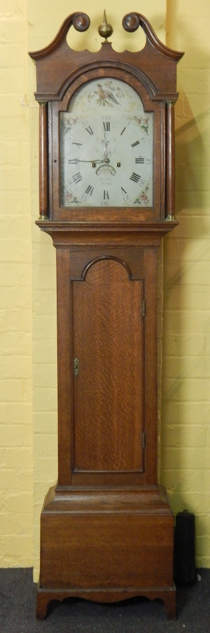 J Coviller, Alford. A mid 19thC longcase clock, the arched dial painted with an Asiatic pheasant,