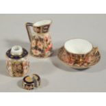 A collection of small Royal Crown Derby trinkets, to include small ginger jar and cover (AF), tea