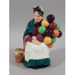 A Royal Doulton figure, The Old Balloon Seller, HN1315, 22cm high.