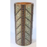 An early 20thC Doulton Lambeth stick stand, by Emily Welch, the cylindrical body raised with a