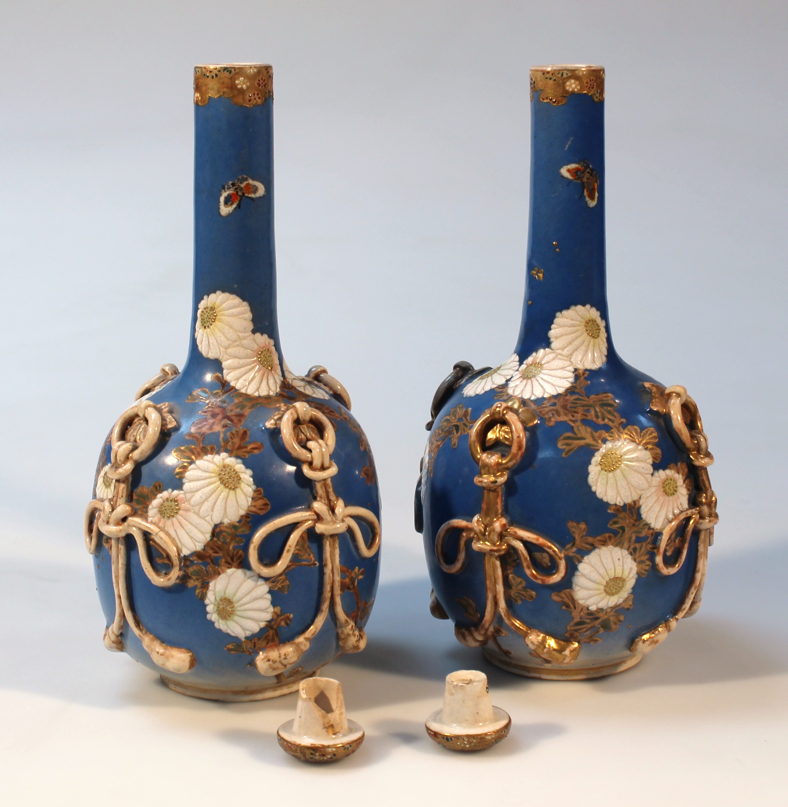 A pair of 20thC Japanese earthenware bottle vases and stoppers, each bulbous body raised with an - Image 2 of 3