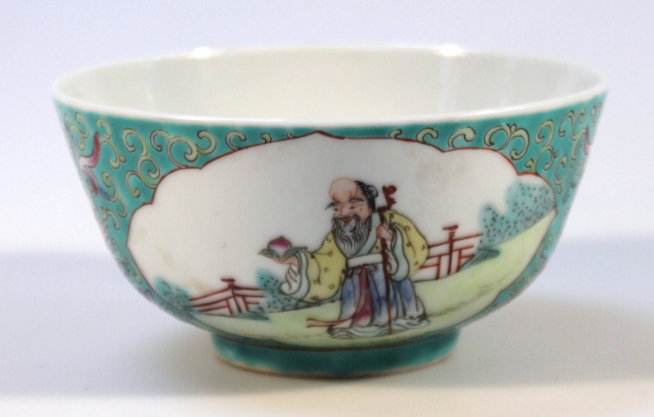 A 20thC Jiangxi Jingdezhen Chu Pin famille vert bowl, the circular body decorated with panels of