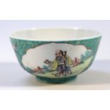 A 20thC Jiangxi Jingdezhen Chu Pin famille vert bowl, the circular body decorated with panels of