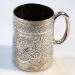 A Victorian silver christening mug, by the Goldsmiths Alliance, the cylindrical body bright cut with