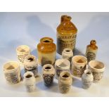 A quantity of various stoneware flagons, etc, to include two coloured Calverley Gee botanical